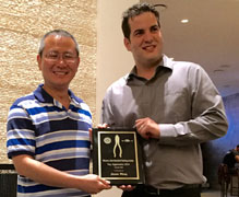 2015 Winner Jason Wang receives Award from W-JETS Executive Director Adrien Livingston